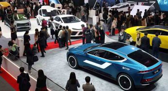 Tech Showdown! EV Giants Battle for the Spotlight